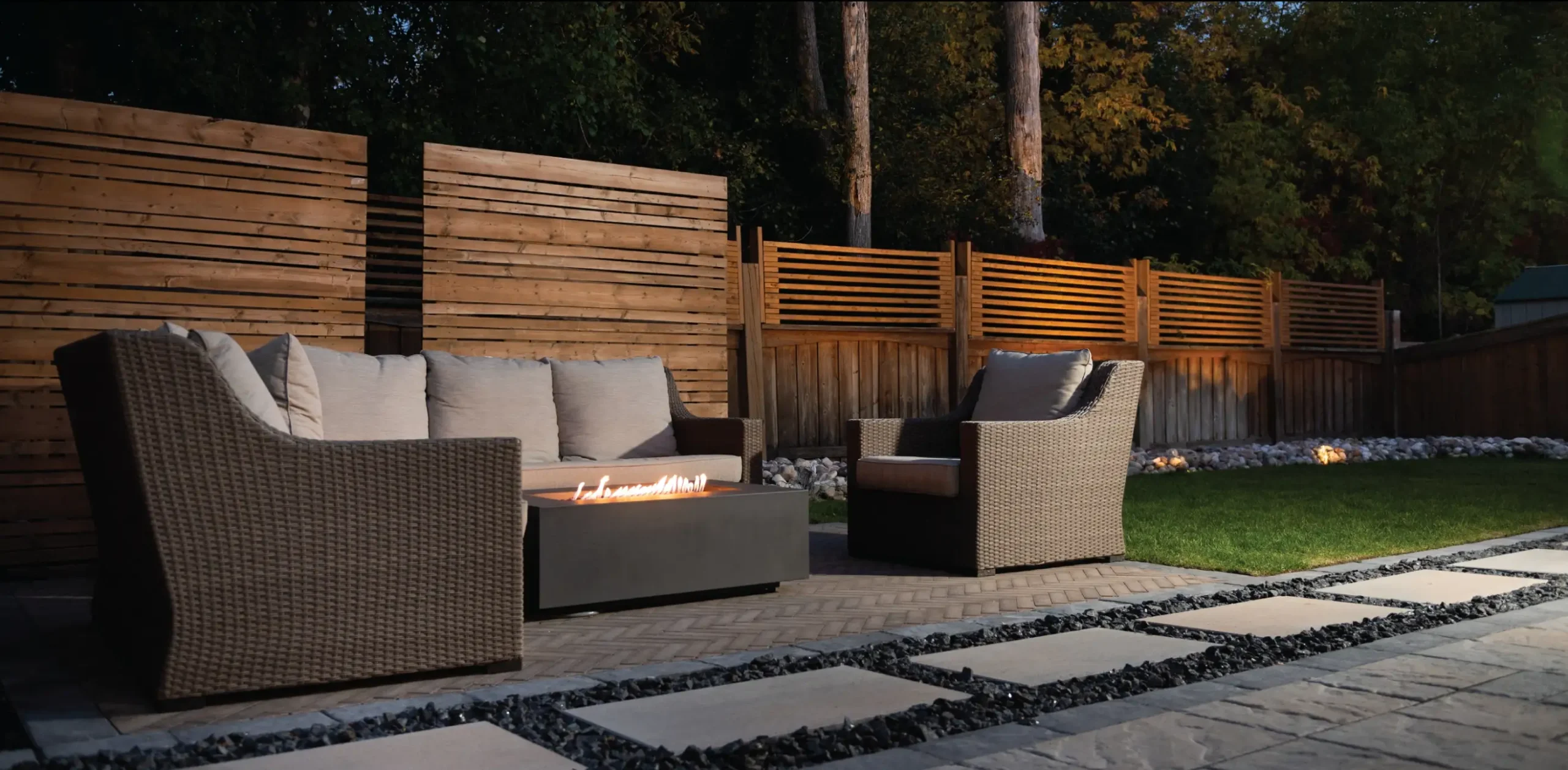 The Magic of Fire Features: Elevating Your Backyard with Fire Pits and Fireplaces